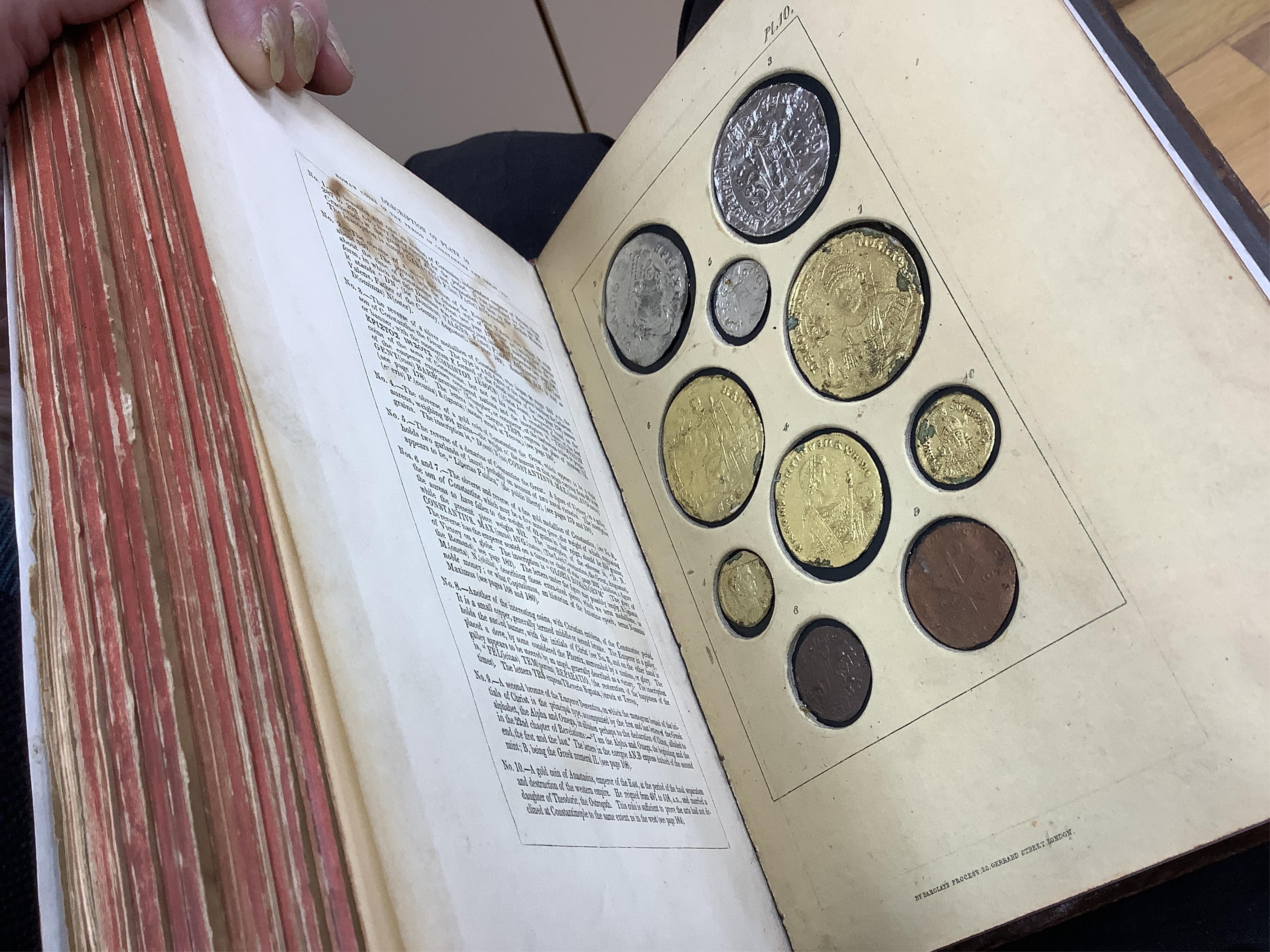 Humphreys, Henry Noel. Ancient Coins and Medals. London: Grant and Griffith, 1850. Octavo, original elaborately embossed full brown calf, marbled endpapers with 114 relief facsimiles of coins and medals on ten thick moun